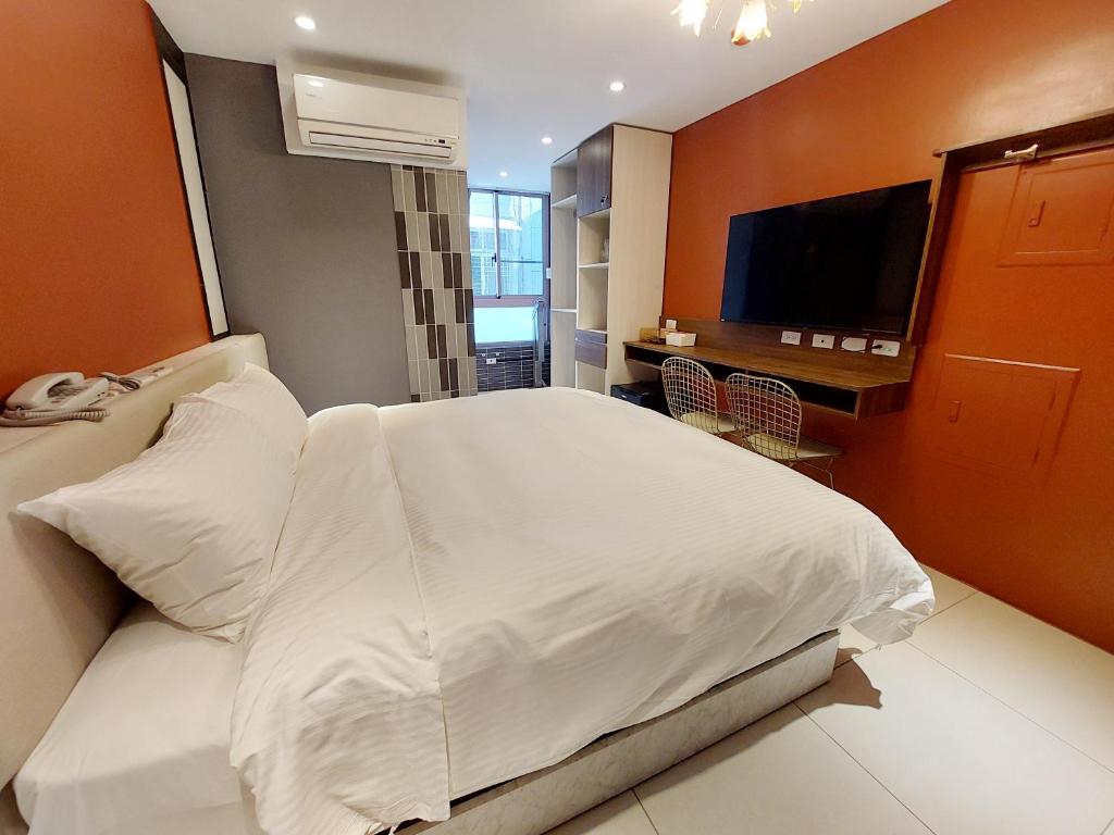 TV a/nebo společenská místnost v ubytování 安平商旅Choona Hotel Anping