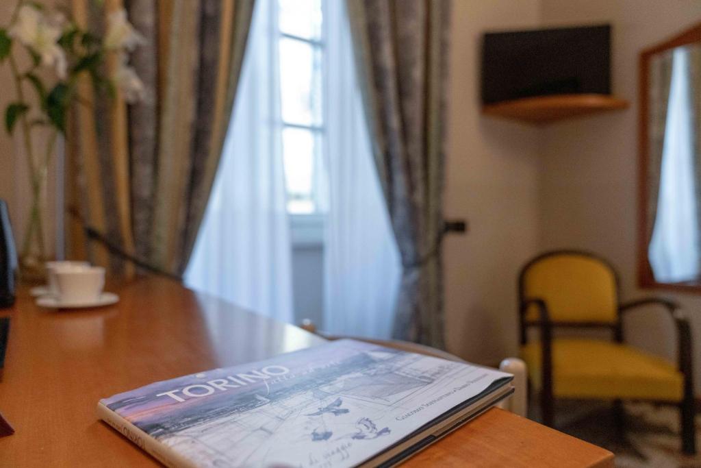 TV a/nebo společenská místnost v ubytování Hotel Bologna