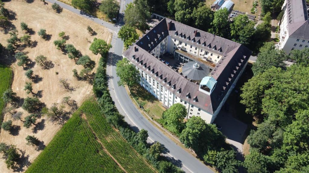 an overhead view of a building with a road at Bildungs- & Tagungshäuser Vierzehnheiligen in Bad Staffelstein