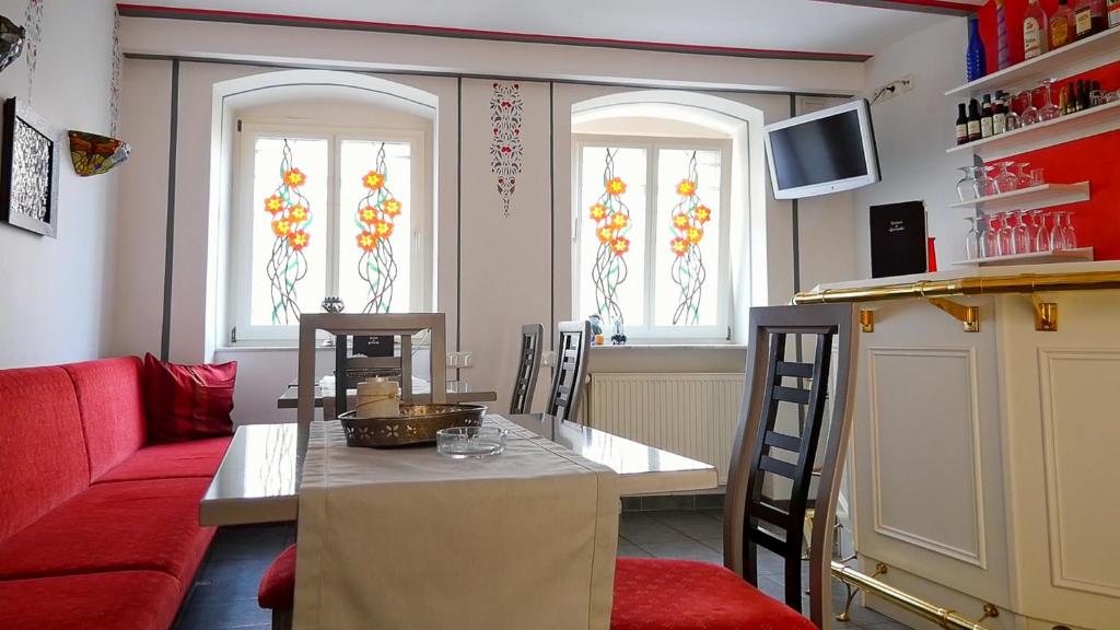 TV a/nebo společenská místnost v ubytování Hotel Jugendstil