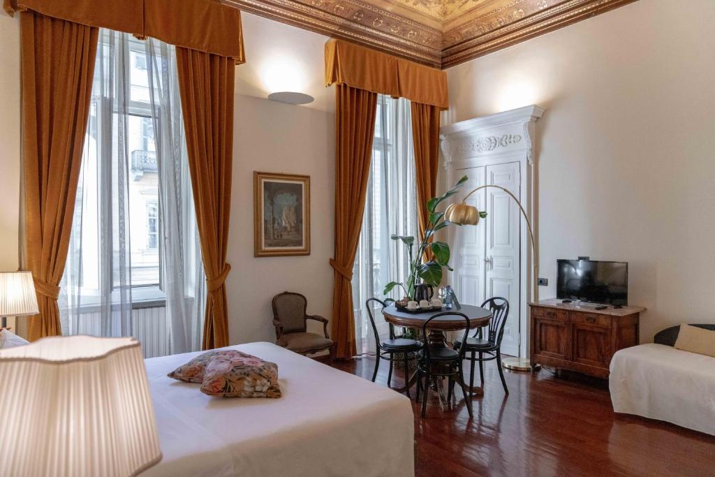 Postel nebo postele na pokoji v ubytování Hotel Bologna