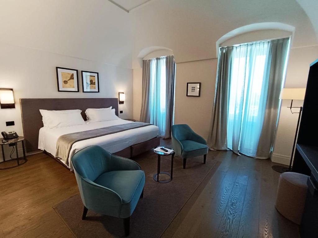 Postel nebo postele na pokoji v ubytování DOGANA RESORT