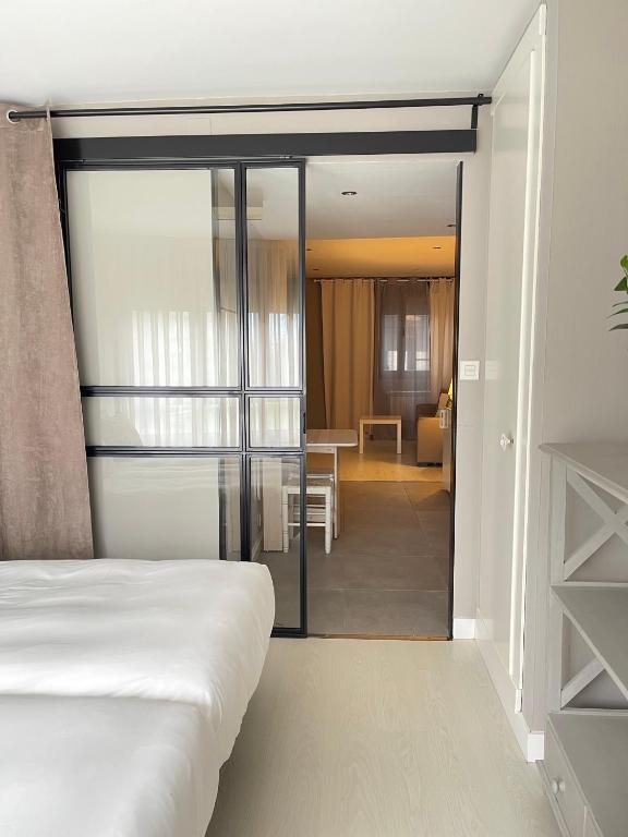 Postel nebo postele na pokoji v ubytování Apartamentos Las Vegas