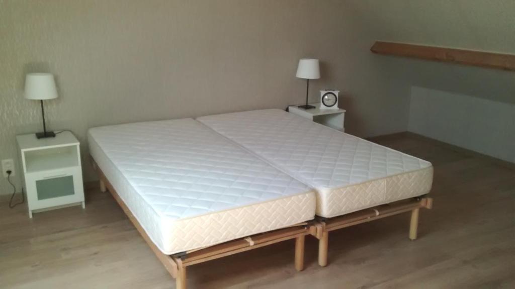 Postel nebo postele na pokoji v ubytování De Lekkermond