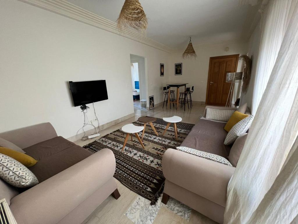 TV a/nebo společenská místnost v ubytování Appartement top capi