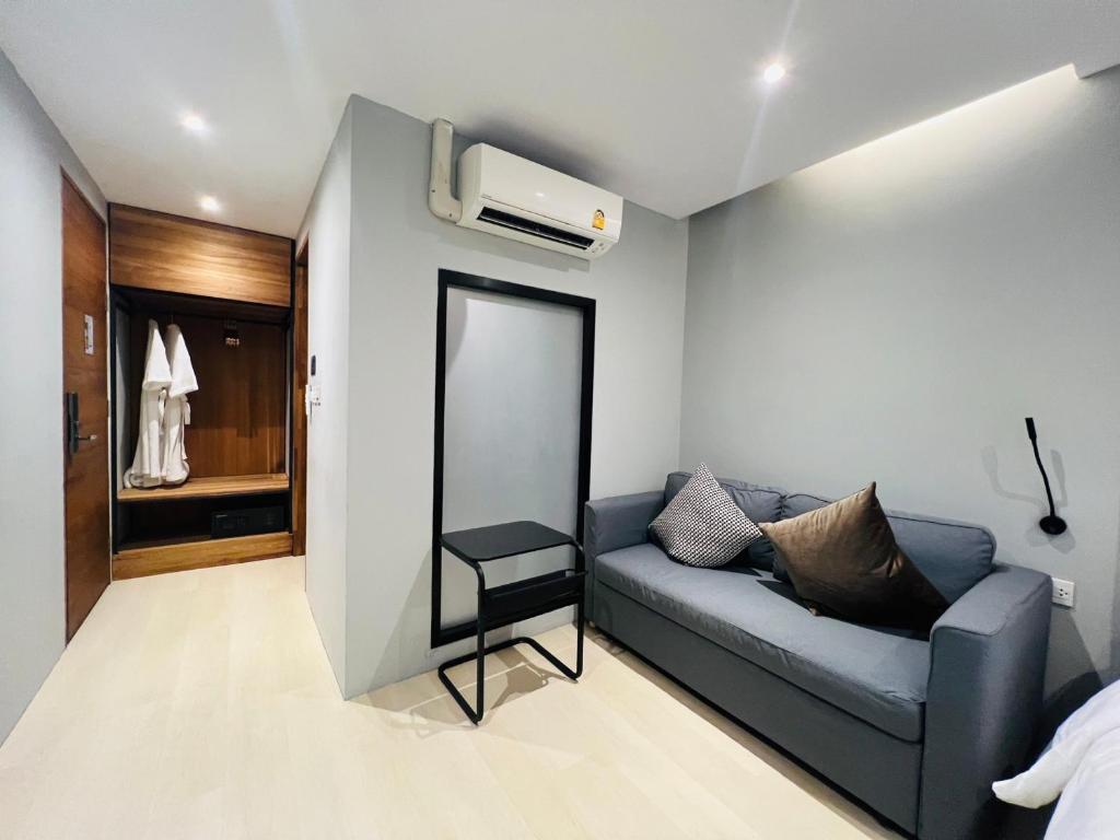 Posezení v ubytování Woodstory Boutique Hotel