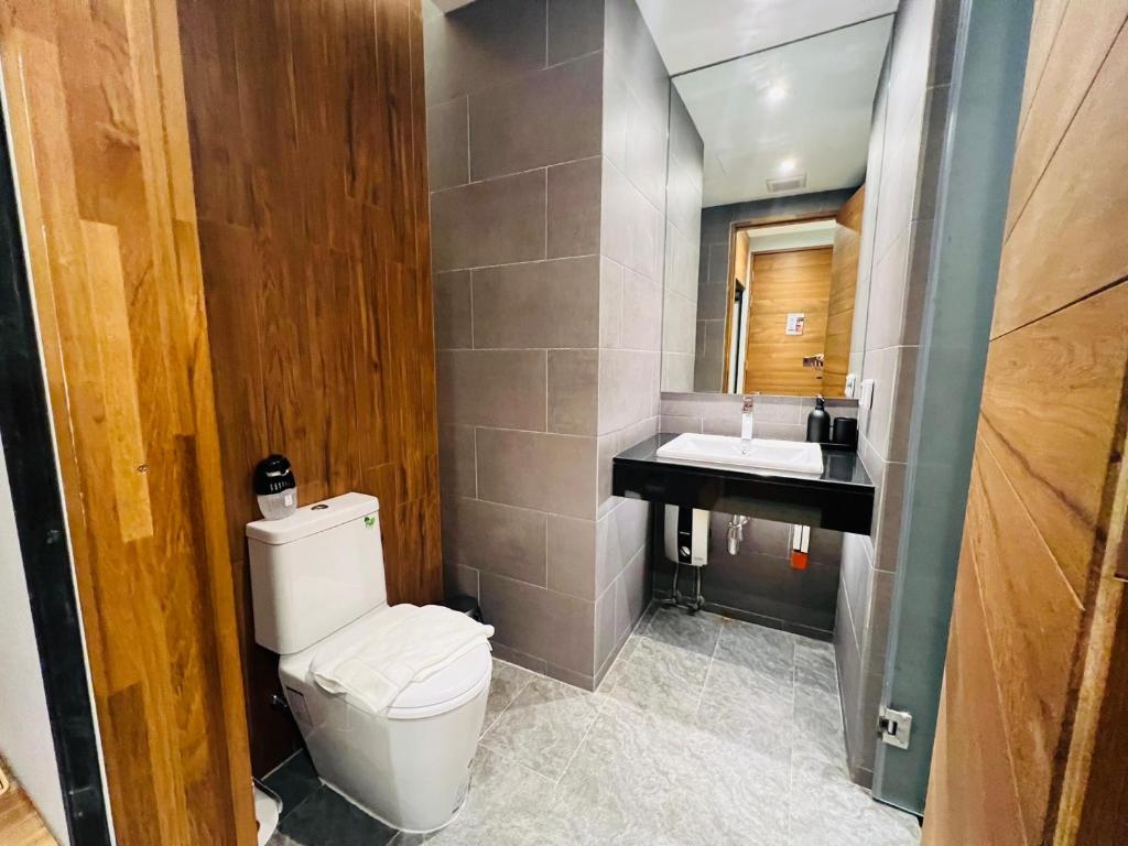 Koupelna v ubytování Woodstory Boutique Hotel