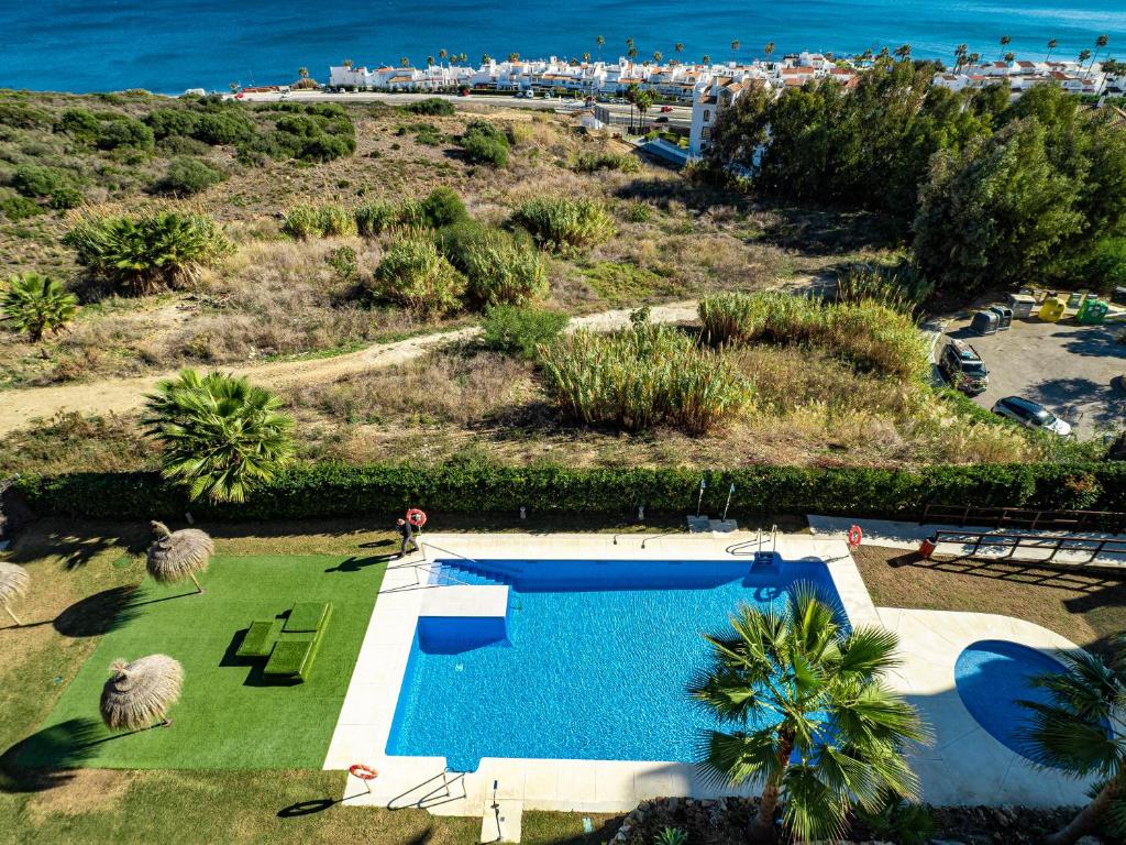 an aerial view of a resort with a swimming pool at Luxury duplex with sea views Blue Suite 3-303 in Manilva