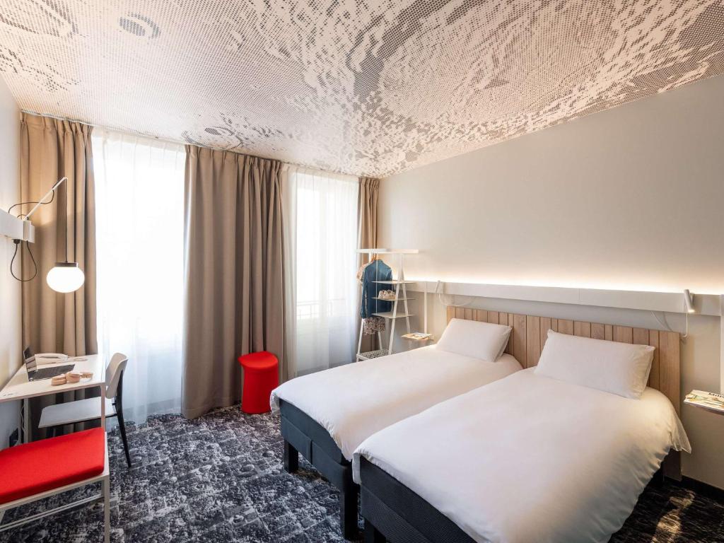 Postel nebo postele na pokoji v ubytování ibis Lyon Centre Perrache