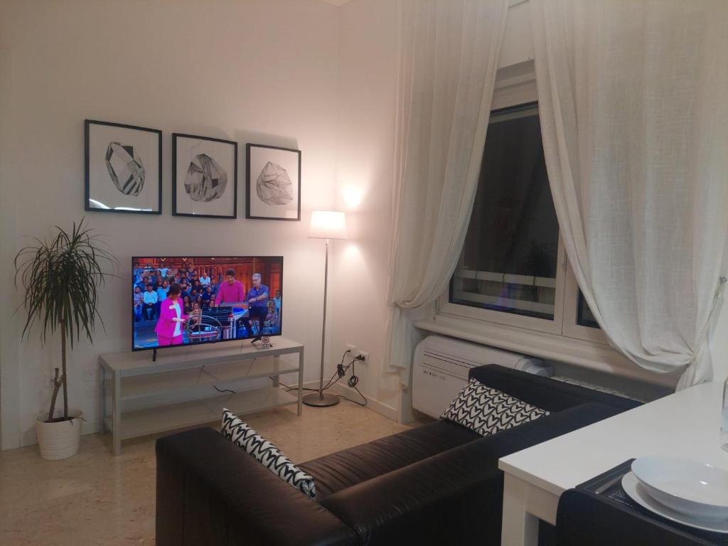 TV a/nebo společenská místnost v ubytování Segrate San Felice