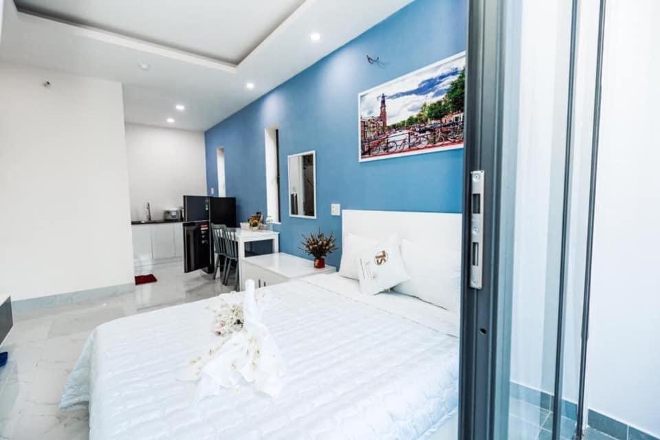 Postel nebo postele na pokoji v ubytování HOTEL & APARTMENT VY VAN