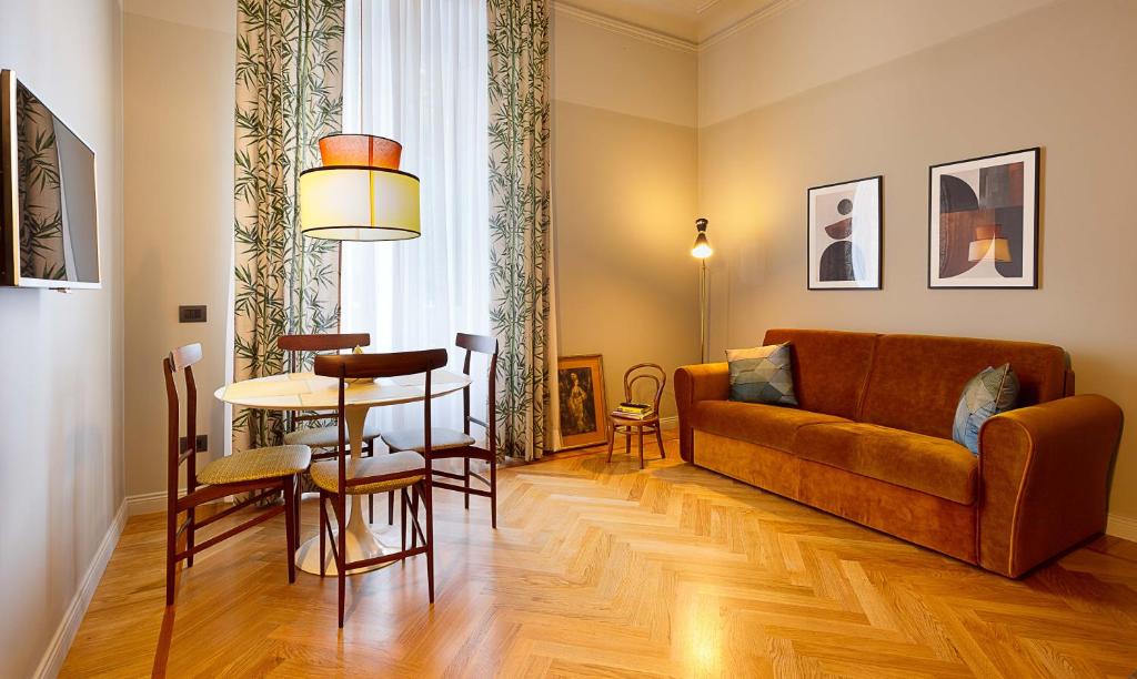 a living room with a couch and a table at Broggi 22 in Milan