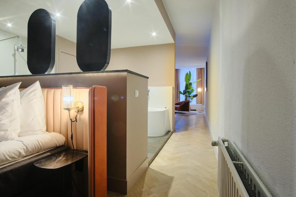 Postel nebo postele na pokoji v ubytování Hotel Halbert