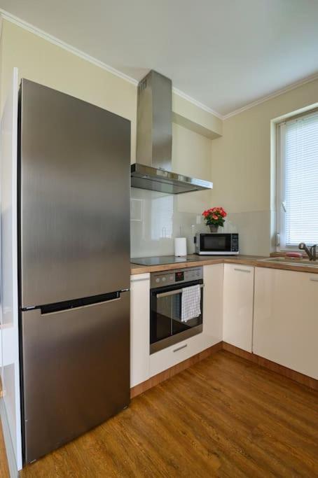 A kitchen or kitchenette at ABG House Ecser