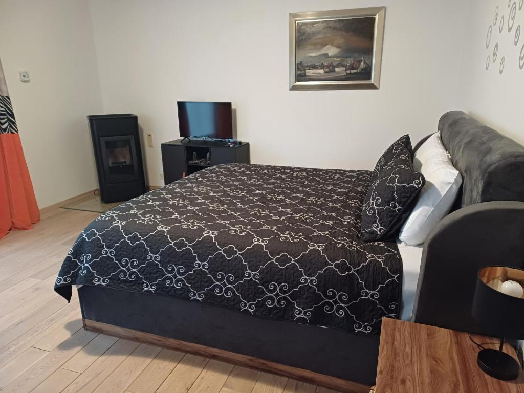 Postel nebo postele na pokoji v ubytování B&B Madoli