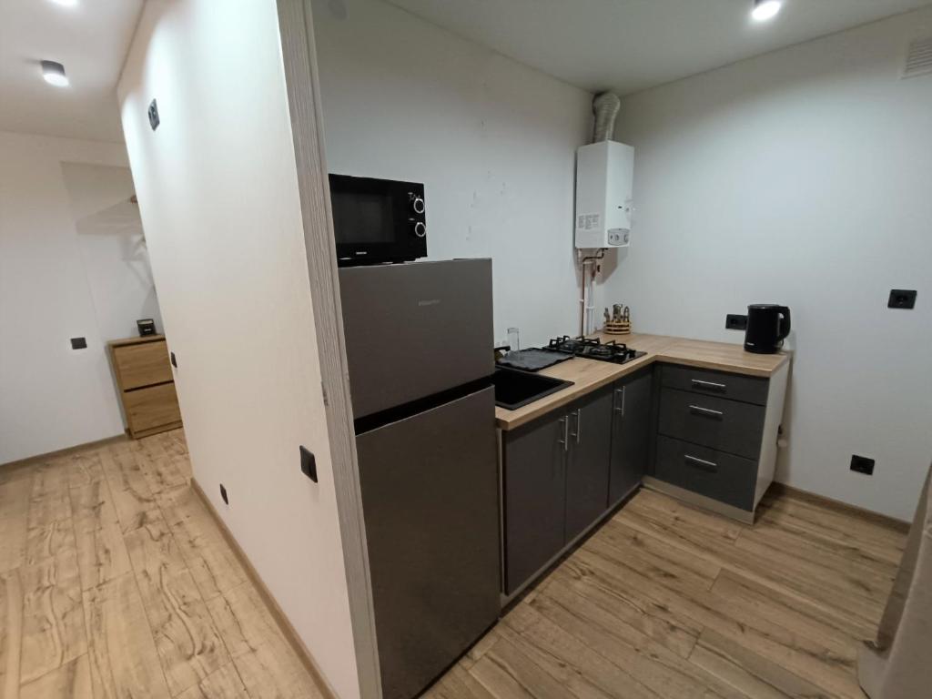 Kuchyň nebo kuchyňský kout v ubytování Jõhvi Home