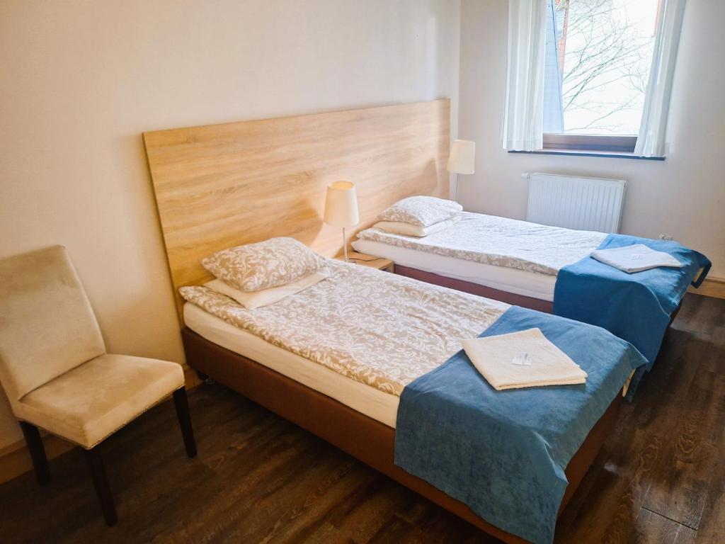 Posteľ alebo postele v izbe v ubytovaní B & B Tomula