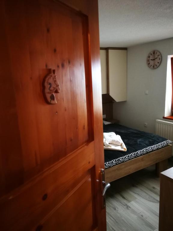 Postel nebo postele na pokoji v ubytování EkoTurizem Viženčar