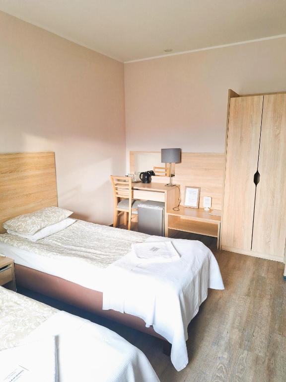Posteľ alebo postele v izbe v ubytovaní B & B Tomula
