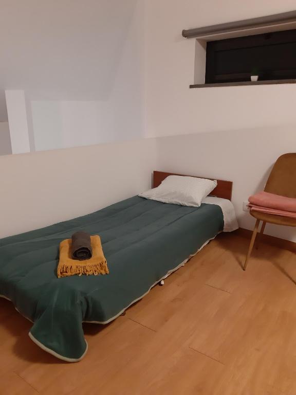Postel nebo postele na pokoji v ubytování Casa Caminho da Esperança