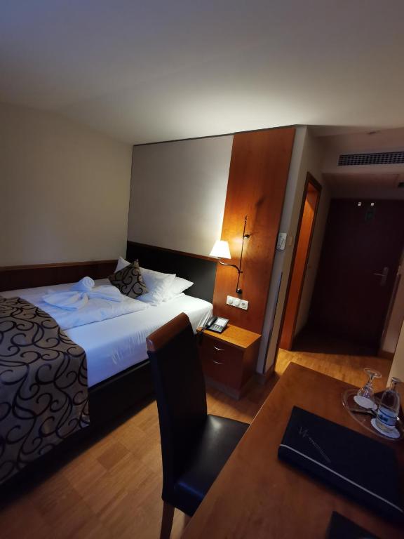 Postel nebo postele na pokoji v ubytování Berghotel Eisenach