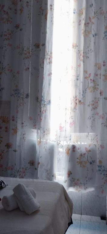 Postel nebo postele na pokoji v ubytování Suite Tati