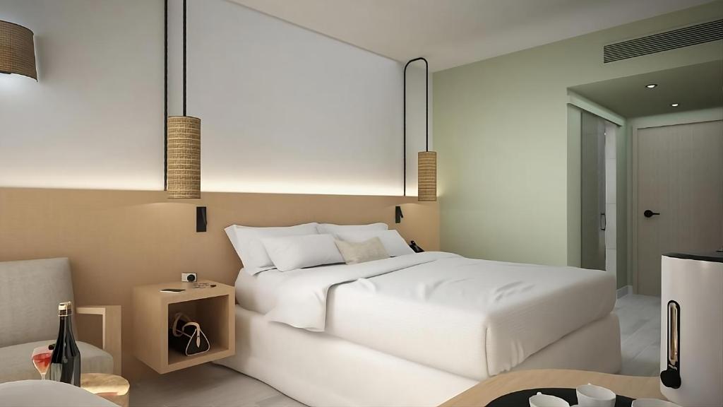 Postel nebo postele na pokoji v ubytování Eleals Boutique Hotel