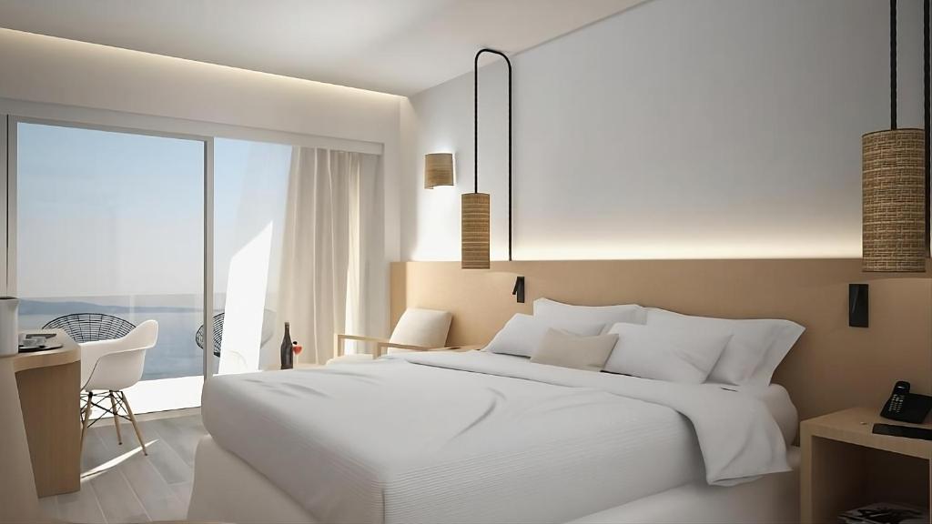Postel nebo postele na pokoji v ubytování Eleals Boutique Hotel
