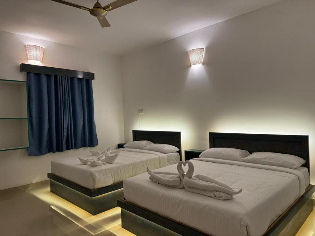 Postel nebo postele na pokoji v ubytování La Antilia Luxury - TIE Hotels & Resorts
