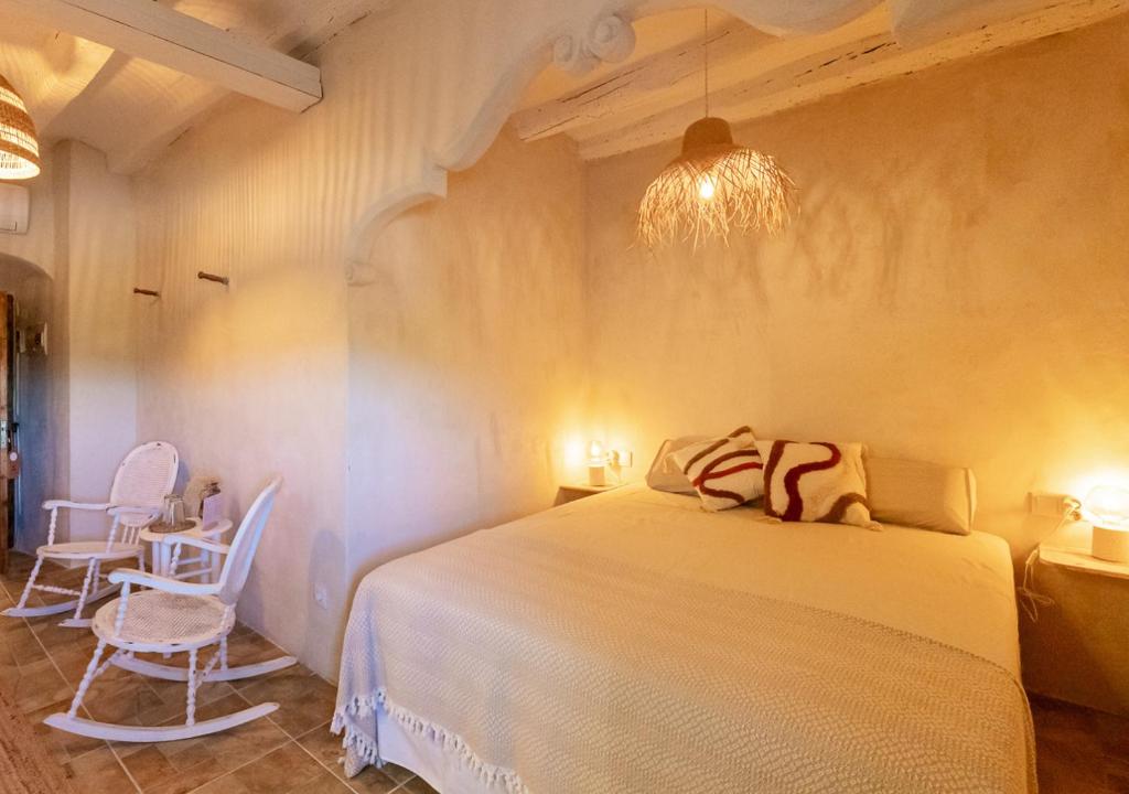 Postel nebo postele na pokoji v ubytování Masia Aubareda