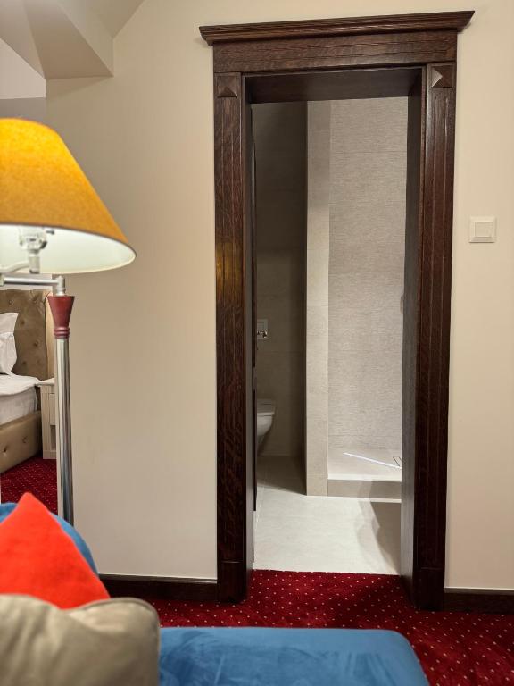 Postel nebo postele na pokoji v ubytování Vila Șipot - Casa Arhitecților