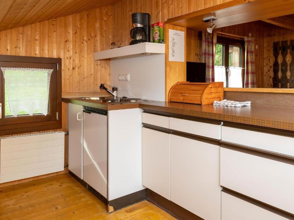 Kuchyň nebo kuchyňský kout v ubytování Alpinchalet Zigjam