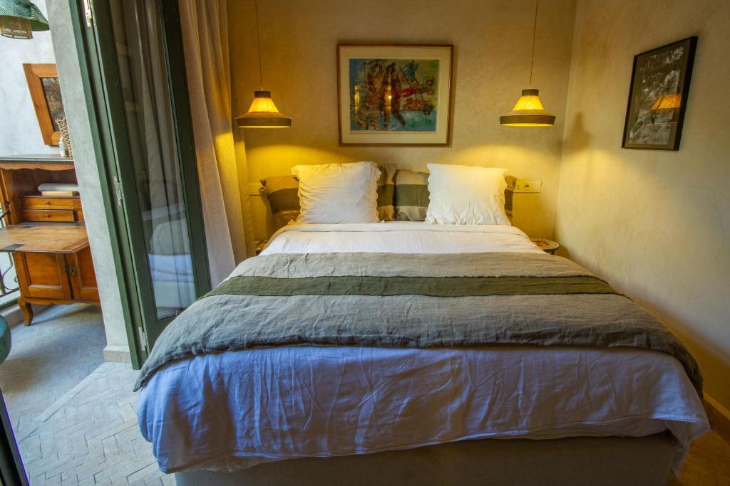 Postel nebo postele na pokoji v ubytování Maison Riad Beryll