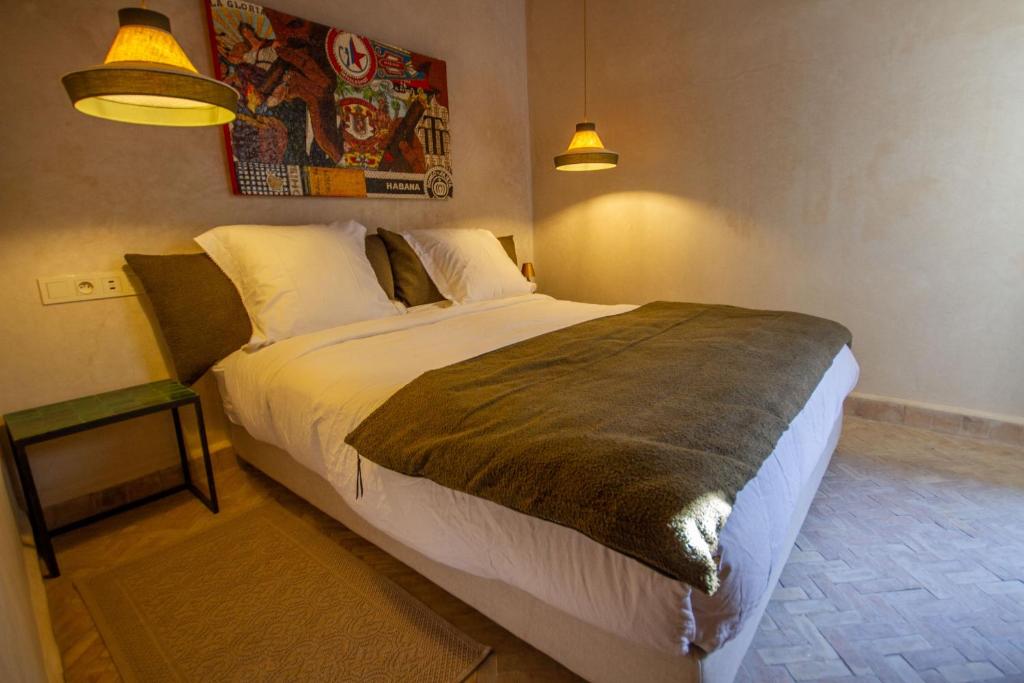 Postel nebo postele na pokoji v ubytování Maison Riad Beryll