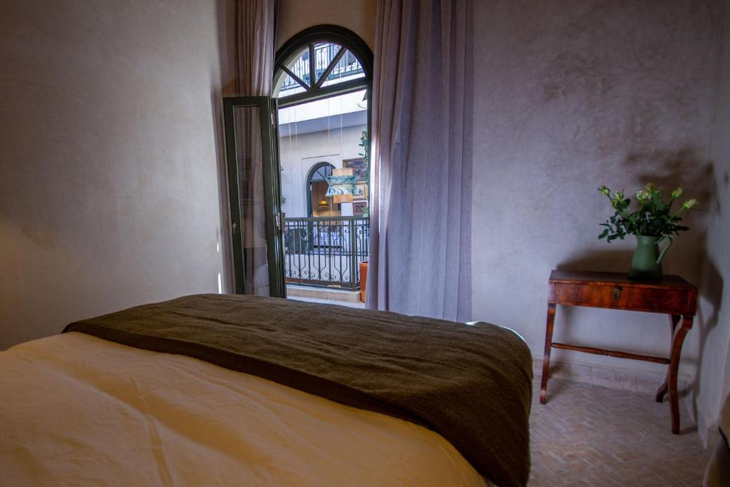 Postel nebo postele na pokoji v ubytování Maison Riad Beryll