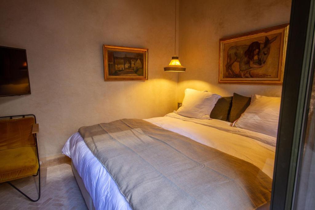 Postel nebo postele na pokoji v ubytování Maison Riad Beryll