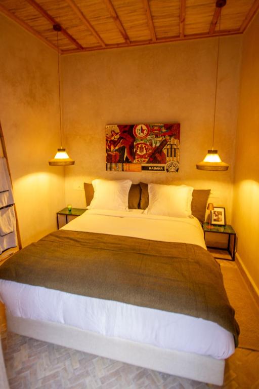 Postel nebo postele na pokoji v ubytování Maison Riad Beryll