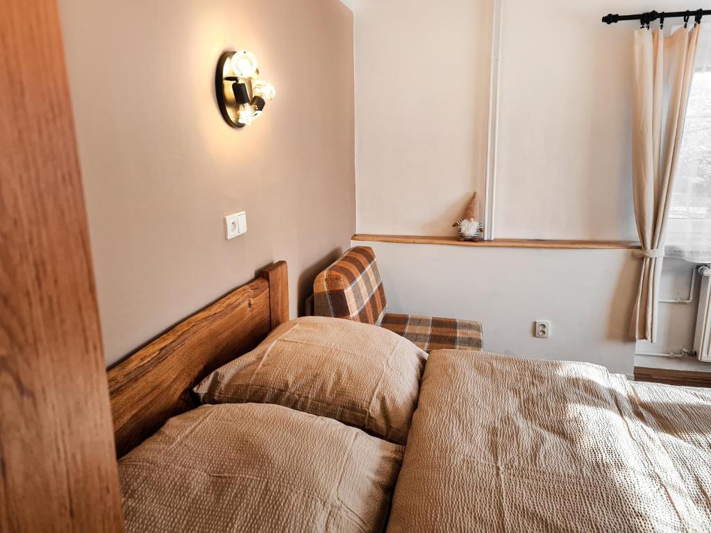 Postel nebo postele na pokoji v ubytování Apartmán Pod Ledovcem