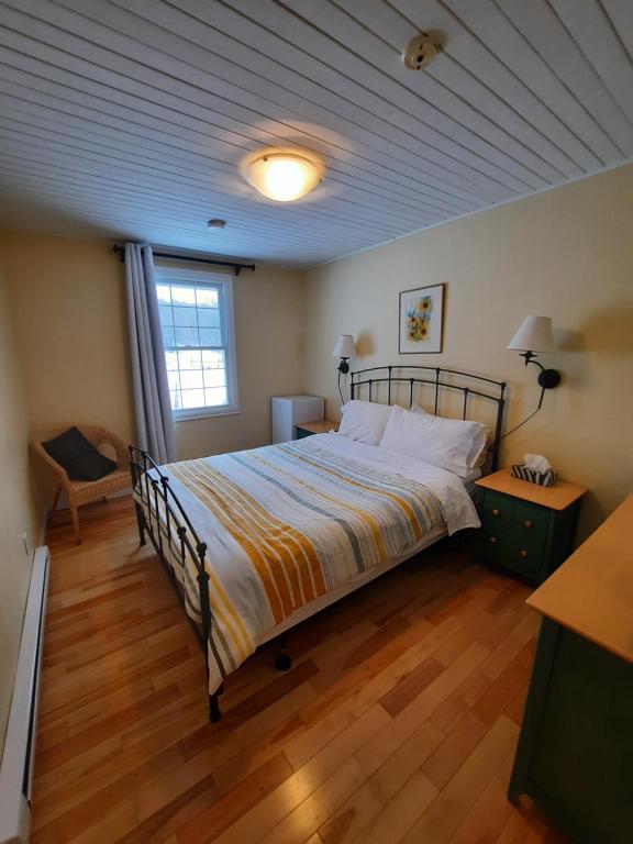 Postel nebo postele na pokoji v ubytování Auberge Schweizer