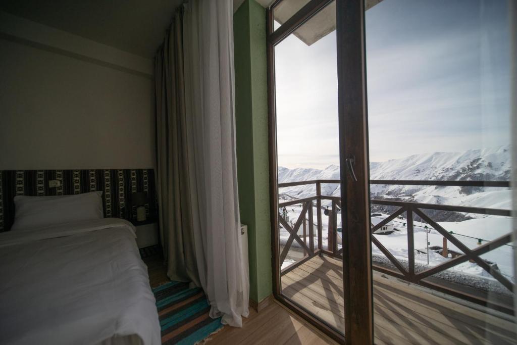Кровать или кровати в номере Chalet Papa Basili