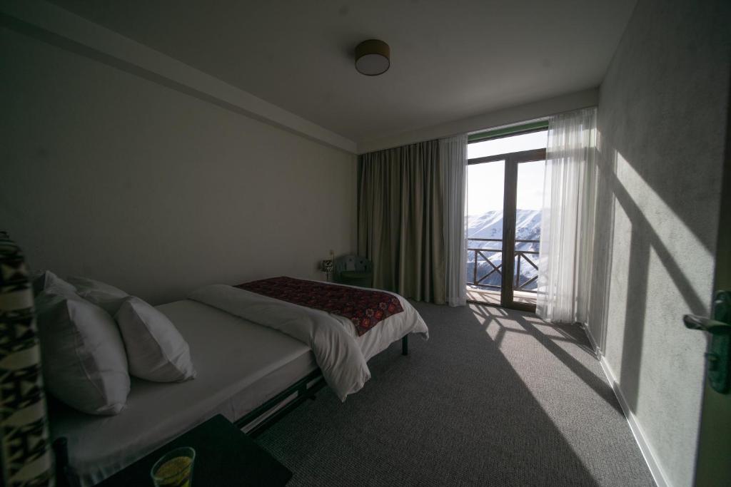 Кровать или кровати в номере Chalet Papa Basili