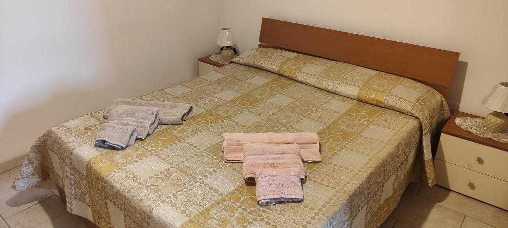 Postel nebo postele na pokoji v ubytování Casa Verga Ispica