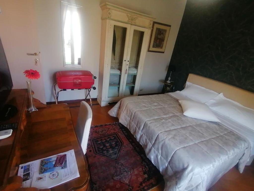 Posteľ alebo postele v izbe v ubytovaní B&B Buon Cammino Tuscia Viterbo - colazione inclusa - convenzionato con impianti termali