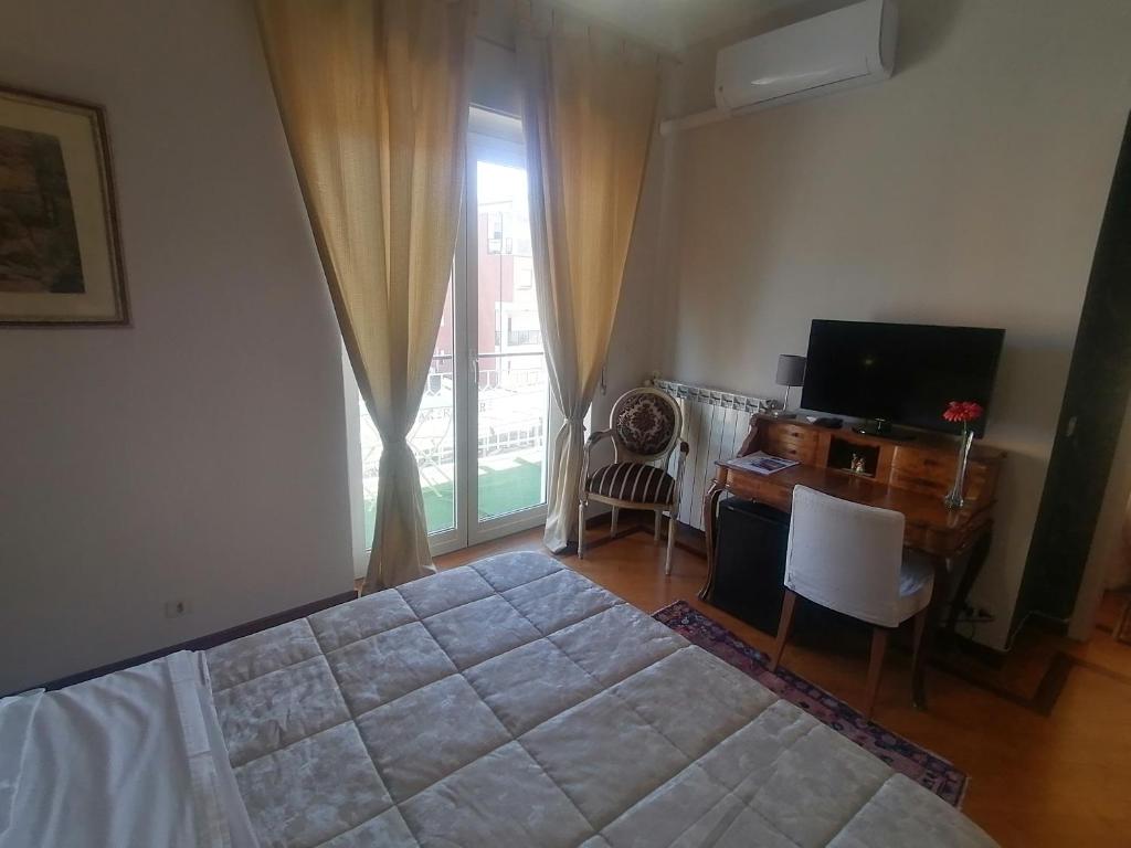 Posteľ alebo postele v izbe v ubytovaní B&B Buon Cammino Tuscia Viterbo - colazione inclusa - convenzionato con impianti termali
