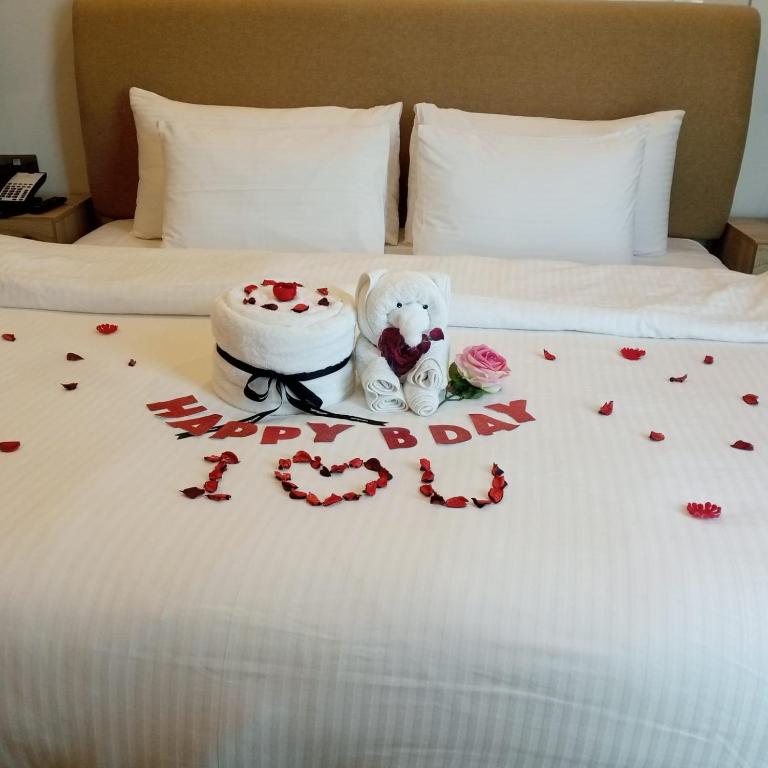 Postel nebo postele na pokoji v ubytování Royal Mansoura Residence Hotel