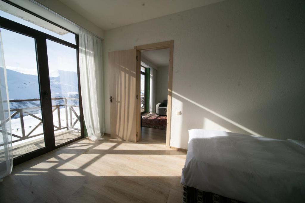 Кровать или кровати в номере Chalet Papa Basili