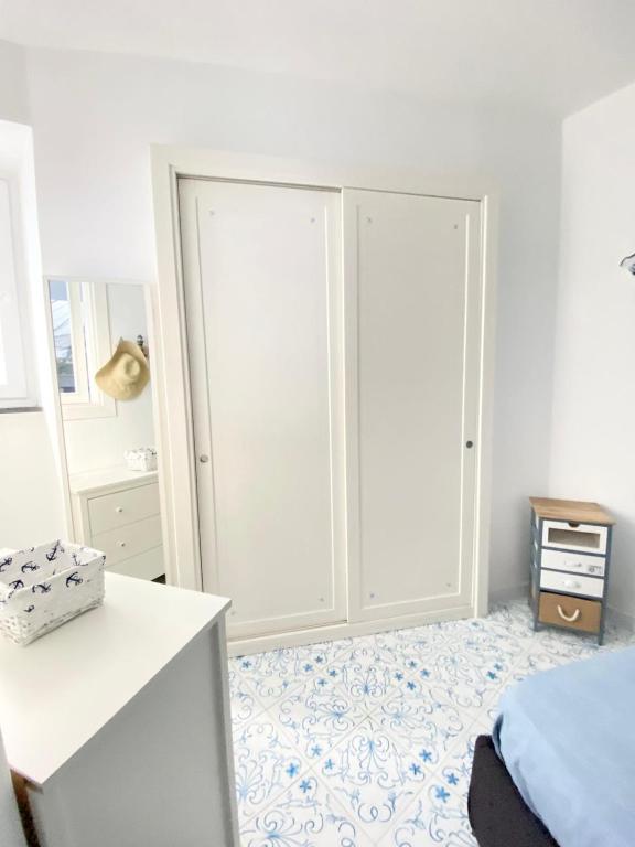 Postel nebo postele na pokoji v ubytování Arime Apartment