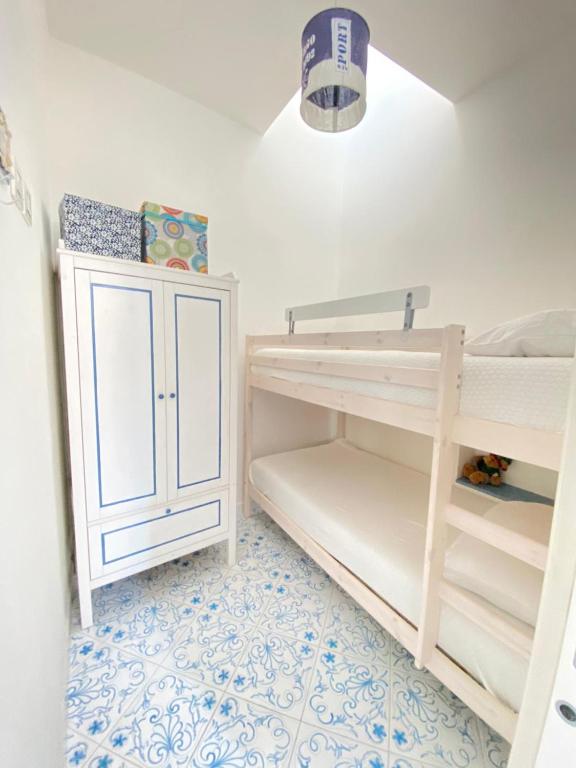 Postel nebo postele na pokoji v ubytování Arime Apartment
