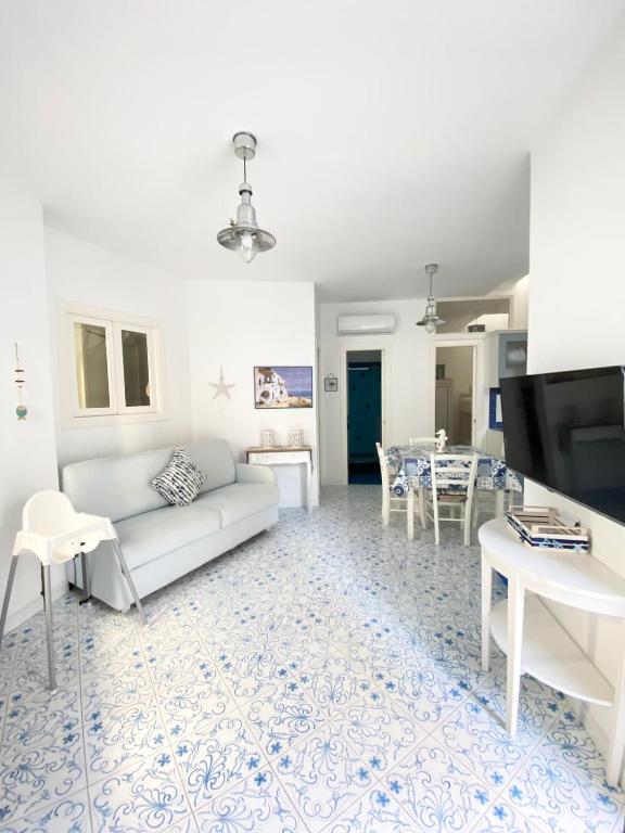 TV a/nebo společenská místnost v ubytování Arime Apartment