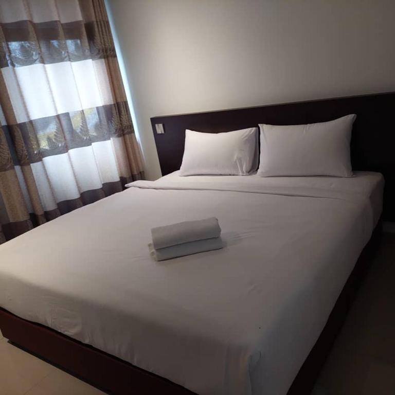 Postel nebo postele na pokoji v ubytování One Dream Hotel